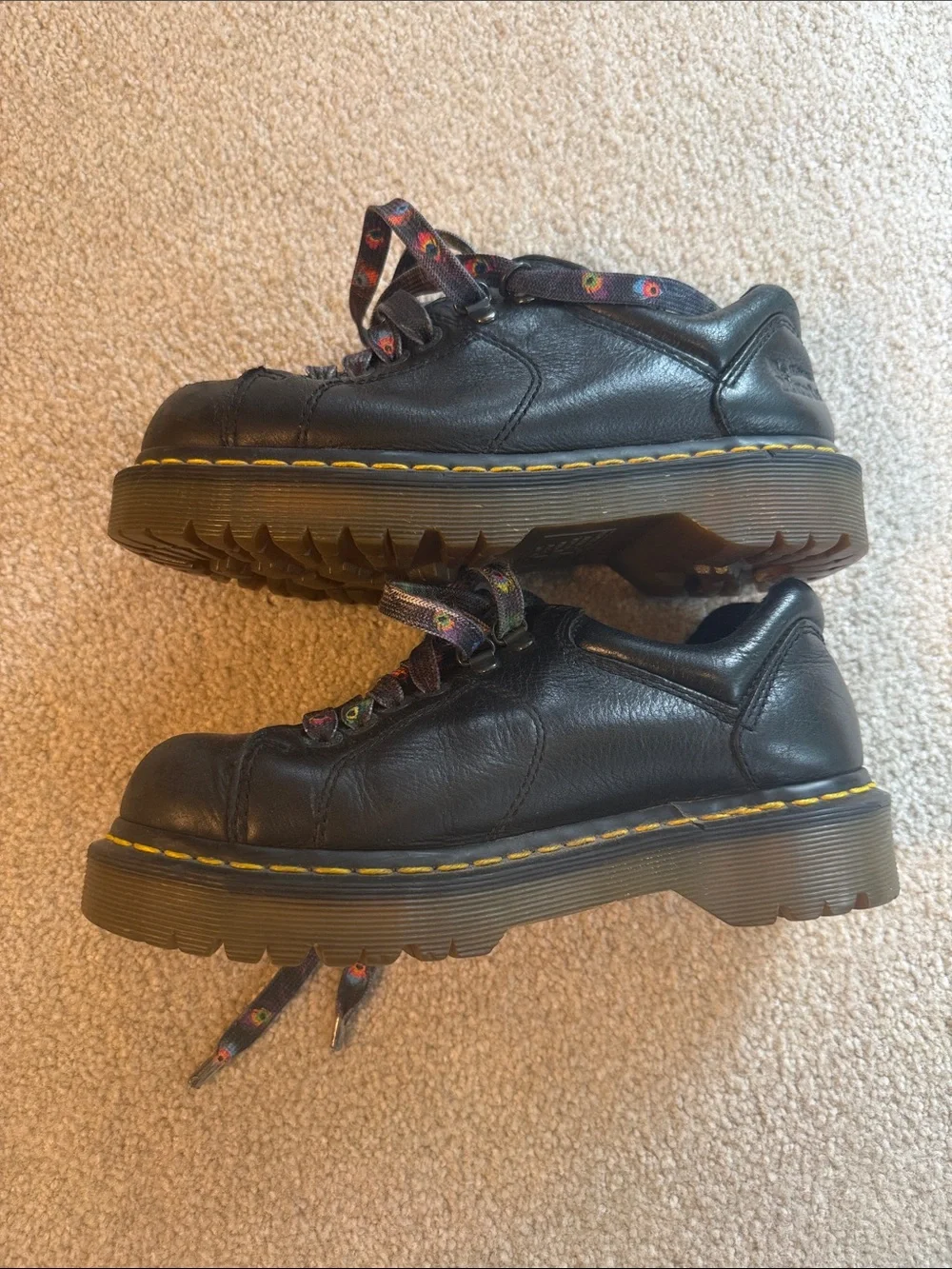 Dr. Marten 10940. Black Leather Platform Lace-Up Shoes with Yellow Stitching -
